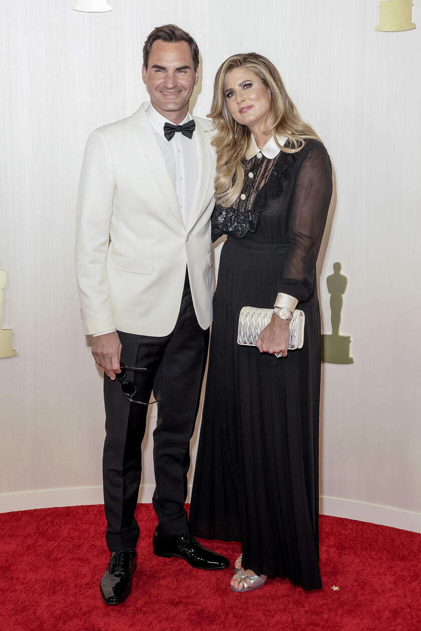 Arrivals - 96th Academy Awards - il campione di tennis Roger Federer con la moglie Mirka © ANSA/EPA